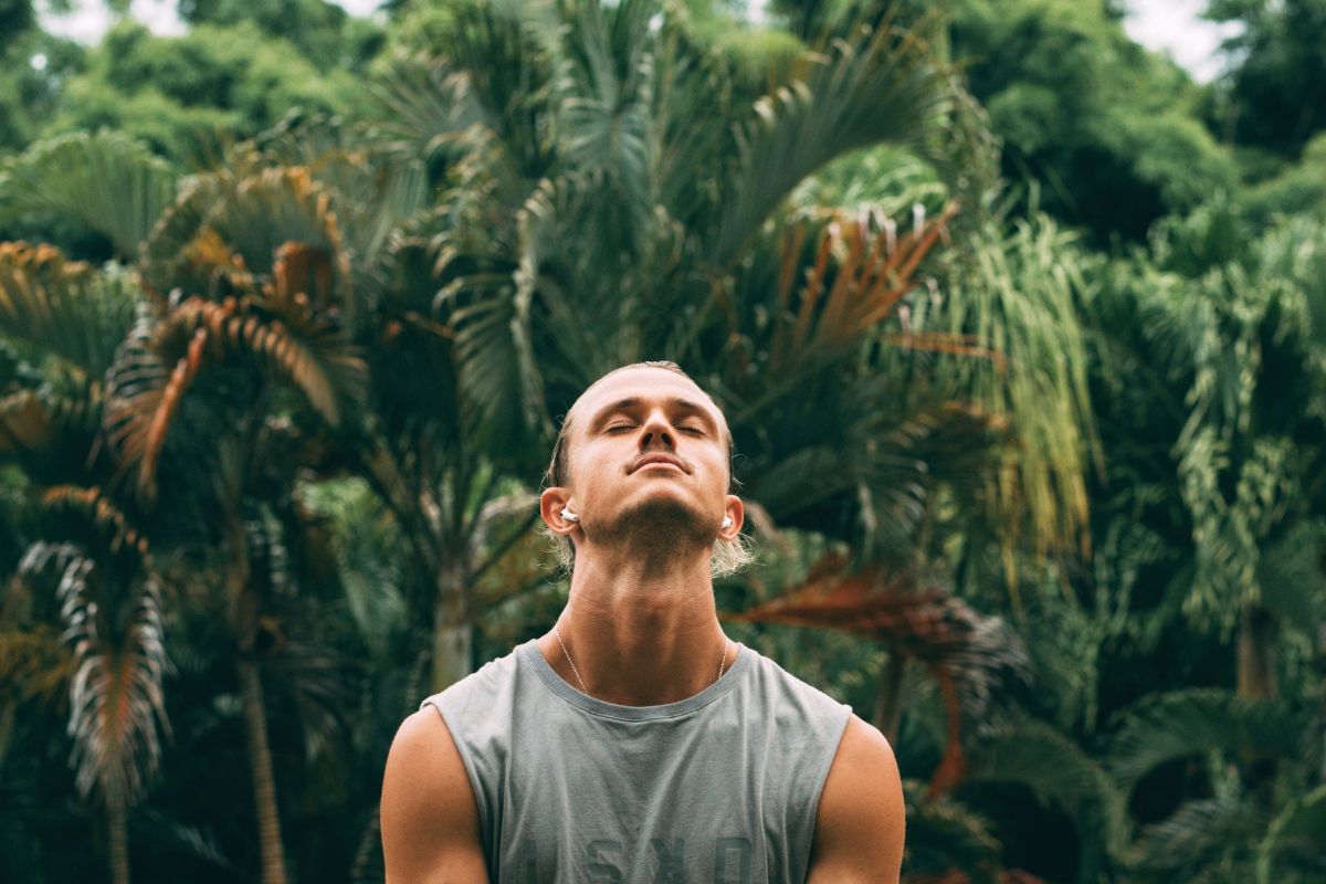 man meditating in nature